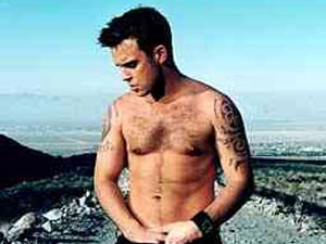 ROBBIE WILLIAMS A NUDO