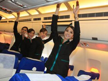 PC Air, la compagnia aerea con l'equipaggio di sole trans - hostess transBASE - Gay.it
