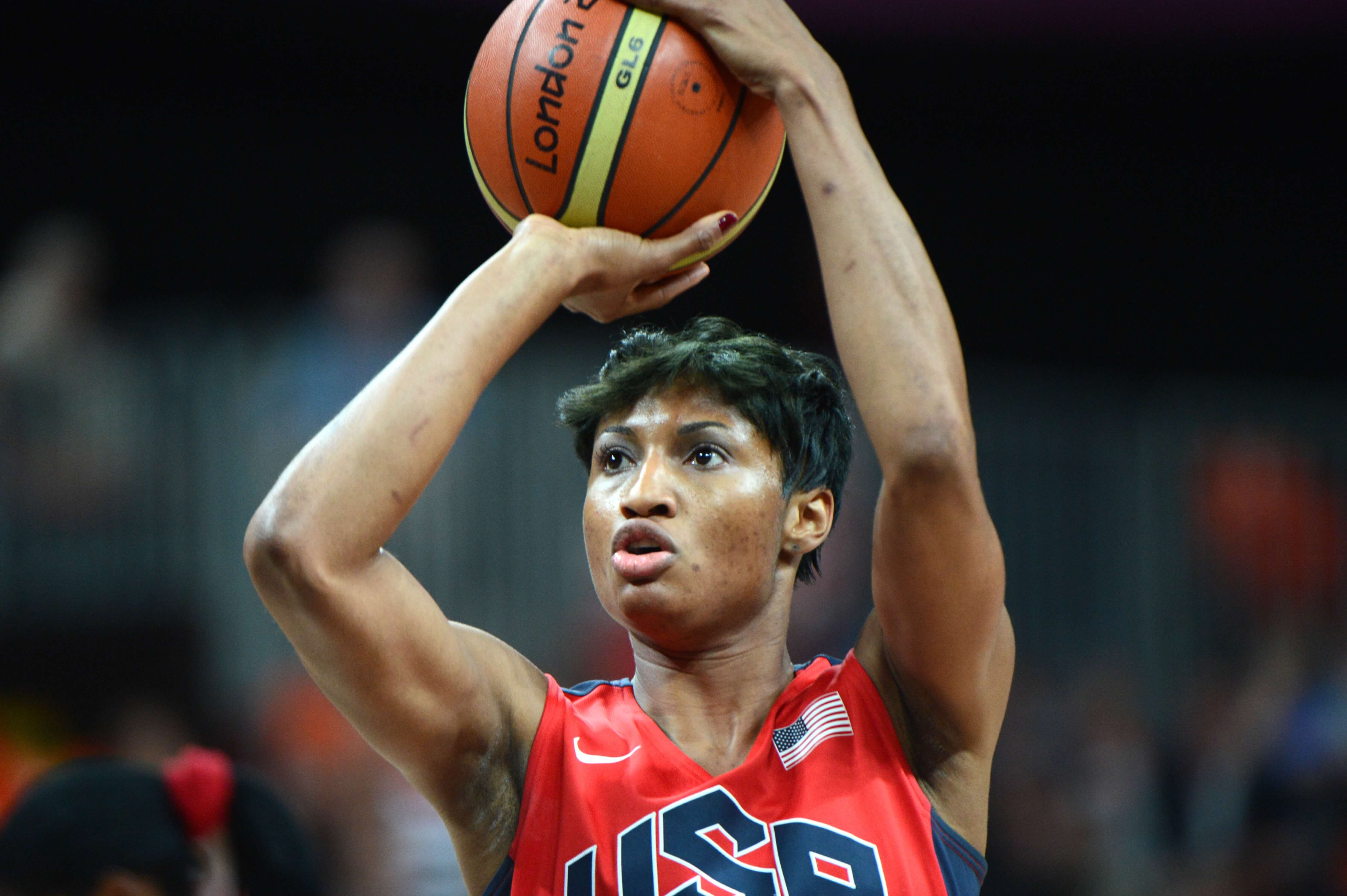 US gard Angel McCoughtry tries to score during the Women's preliminary round group A basketball match of the London 2012 Olympic Games Angola vs USA on July 30, 2012 at the basketball arena in London. USA won 90 to 38. AFP PHOTO / MARK RALSTON (Photo credit should read MARK RALSTON/AFP/GettyImages)