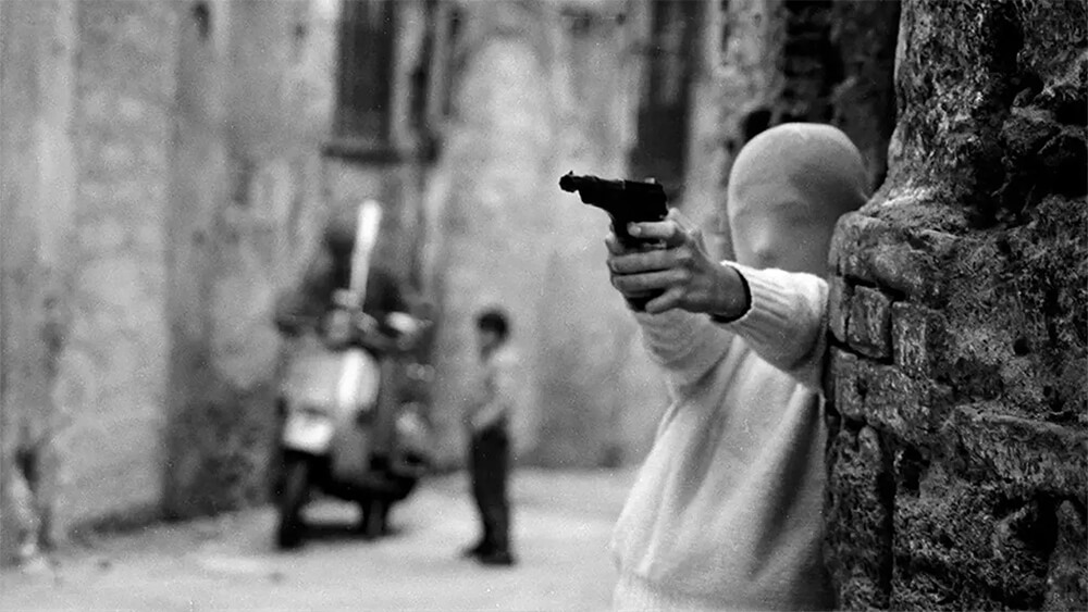 letizia battaglia bambino che spara fotografia