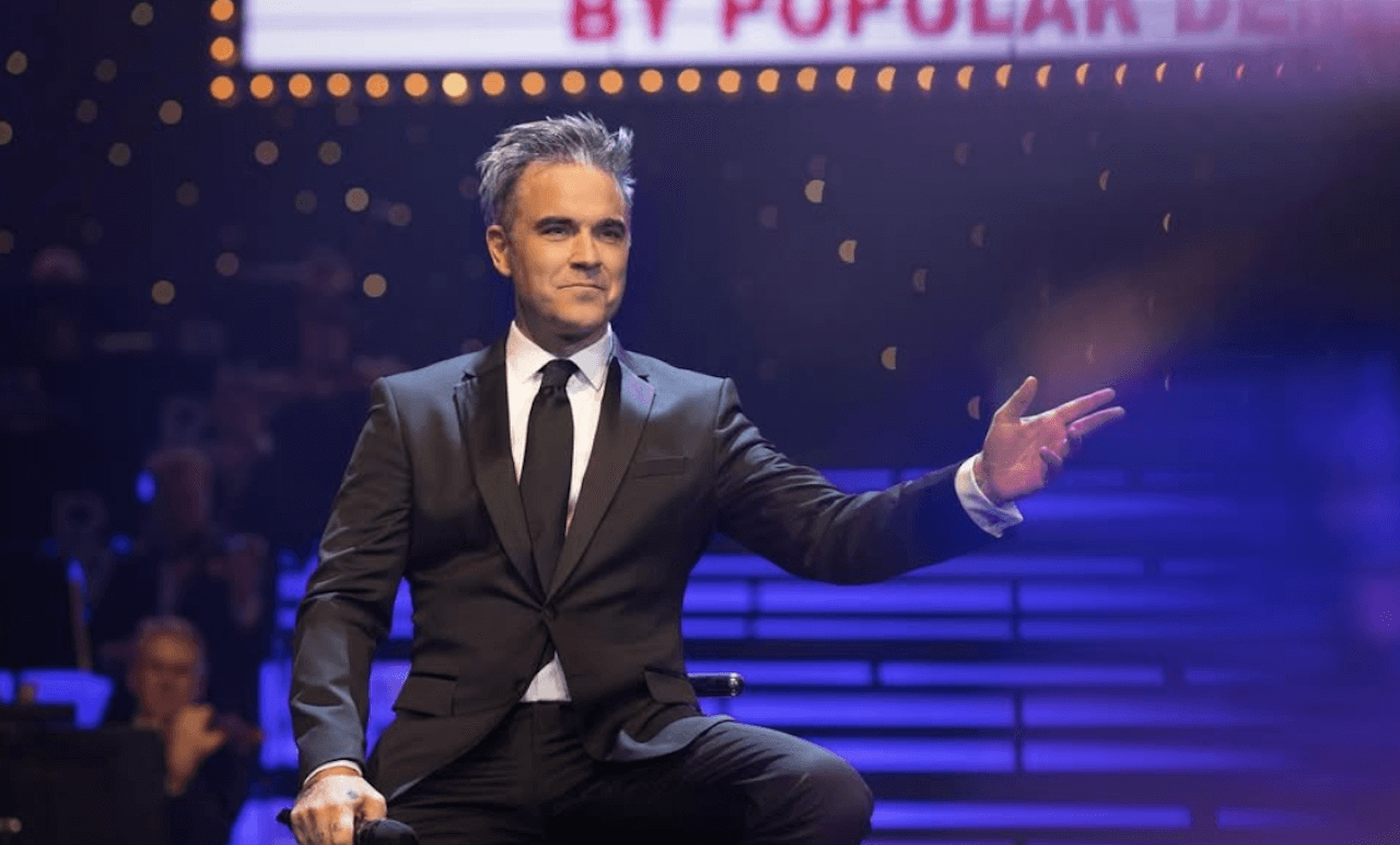 Robbie Williams: "Mai succhiato un ca**o, non troverete mai nessuno che volesse essere gay quanto me" - Robbie Williams 1 - Gay.it