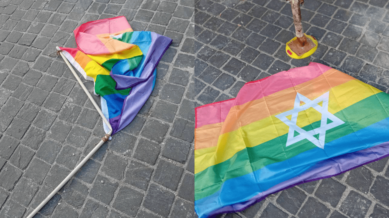 Bandiera arcobaleno con stella di David distrutta al Piceno Pride