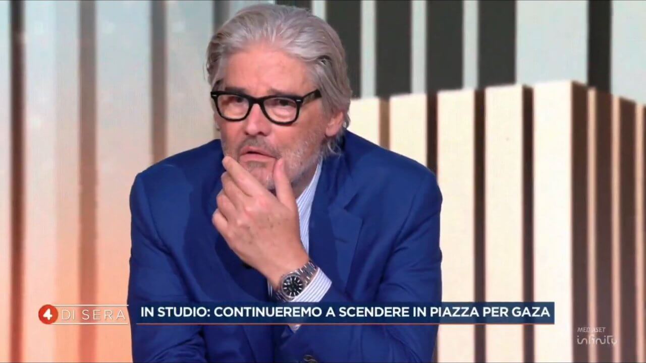Paolo Del Debbio, la sua faccia dopo la svenimento di diretta della sua giornalista